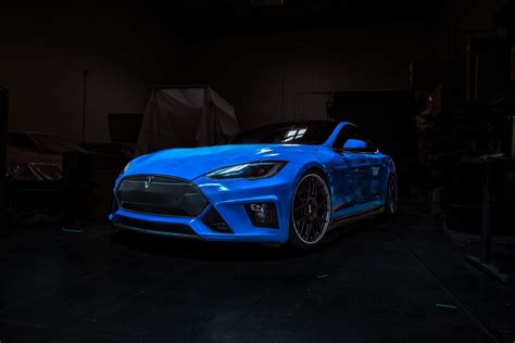 The Amg Of Tesla Unveils Sema Bound Model S Autoblog