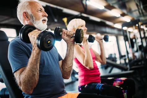 Fit Senior Sporty Couple Working Out Together At Gym For Seniors Magazine