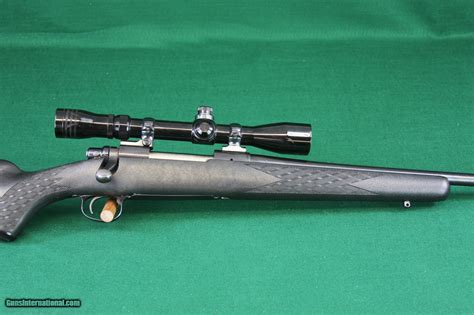 Remington Bolt Action Synthetic Stock Rifle With Redfield Lo Pro Variable Scope