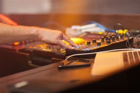 Dj Mixing Music On Console At The Night Club Stock Photo Image Of