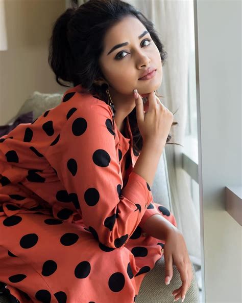 indian hot actress anupama parameshwaran photo shoot in maroon dress tollywood boost