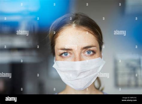 Portrait Of Woman Wearing Surgical Mask Stock Photo Alamy