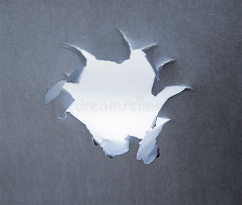 Hole Punched In A Paper Sheet Stock Image Image Of Antique