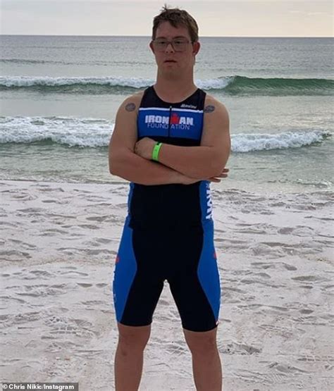 Record Setting Athlete With Down Syndrome Ts Triathlon Medal From Historic Race To His Mother