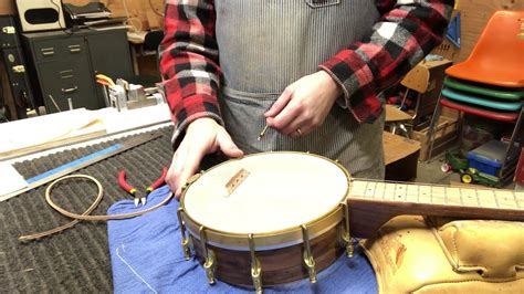 tying a banjo uke string on a no knot tailpiece youtube