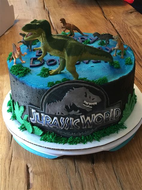 Jurassic World Cake Logo And Greenery All Done In Modeling Chocolate