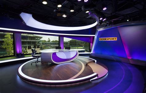 A Television Studio With Purple And Blue Lighting