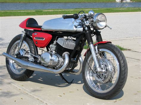 Is the official distributor of suzuki motorcycles in the the bike displays a strong built and is packed with some excellent features like a digital instrument panel. 2 STROKE BIKER BLOG: Stunning T500 Cafe Racer.