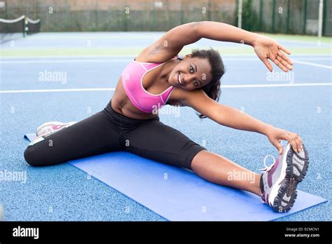 Young Woman Stretching Stock Photo Alamy