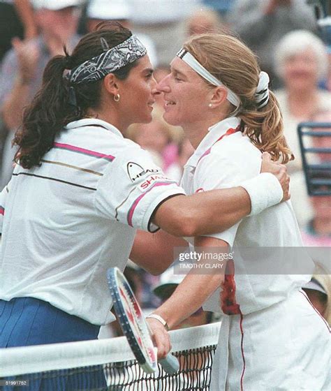 Steffi Graf Of Germany And Gabriela Sabatini Of Argentina Embrace At