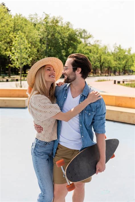 Woman In Straw Hat Hugging Boyfriend Stock Photo Image Of Dating