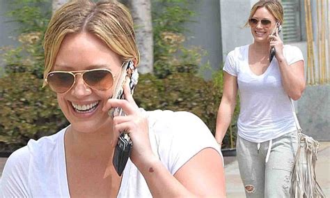 Hilary Duff Grins As She Chats On The Phone On Her Way To The Spa