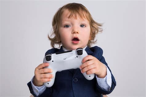 Premium Photo Baby With A Game Controller