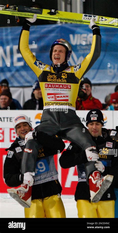 Austria S Thomas Morgenstern Center Celebrates After His Final Jump With Team Mates Andreas