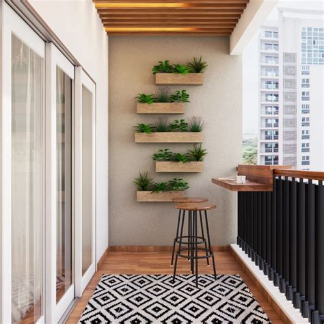 Compact Balcony Design With Wooden Table And Wall Planters Livspace