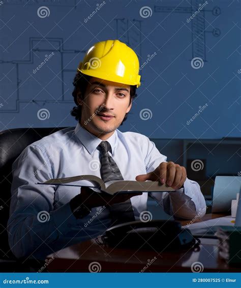 Young Construction Architect Working On Project At Night Stock Image