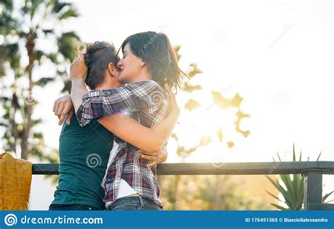 Happy Gay Couple Embracing During Sunset In Park Outdoor Young Lesbian Women Having A Tender