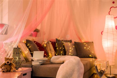 Fairy lights for teenage bedrooms. Fairy Lights In Teen Bedroom Stock Image - Image of modern ...
