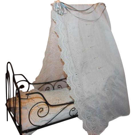 Today people buy them for their looks, while in the past they this room has many antique touches, with a shining example of classic french neoclassical bed. French Antique Canopy Doll bed, metal frame with canopy ...