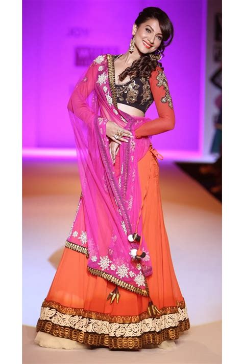 bollywood actress saree collections guhar khan in orange and pink designer lehenga at wifw
