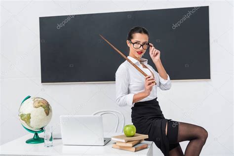 Young Sexy Teacher Stockings Pointer Sitting Desk Front Free Download Nude Photo Gallery