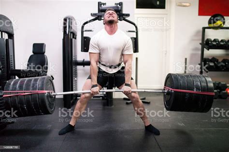 Athletes Lifting Barbells Exercise At Gym Stock Photo Download Image
