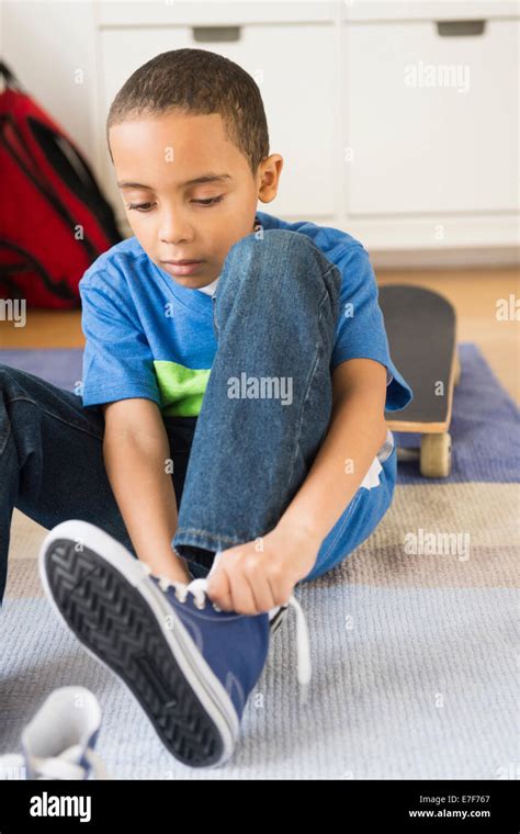 Child Tying Shoe Hi Res Stock Photography And Images Alamy