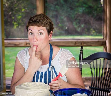 Woman Licking Icing Photos And Premium High Res Pictures Getty Images