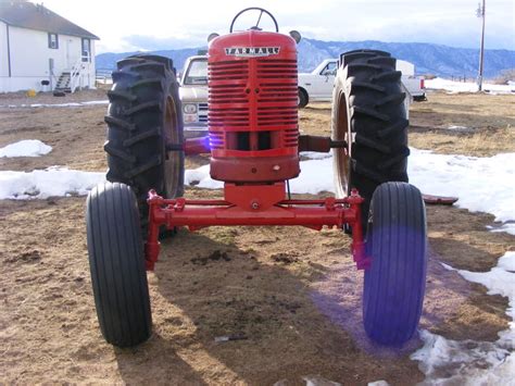 Need new tires?shop for tires. Big tires on an M - not for Farmal... - Yesterday's Tractors