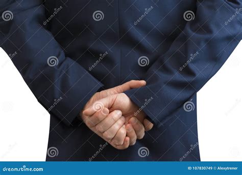 Businessman Standing With Folded Hands Behind The Back Stock Image