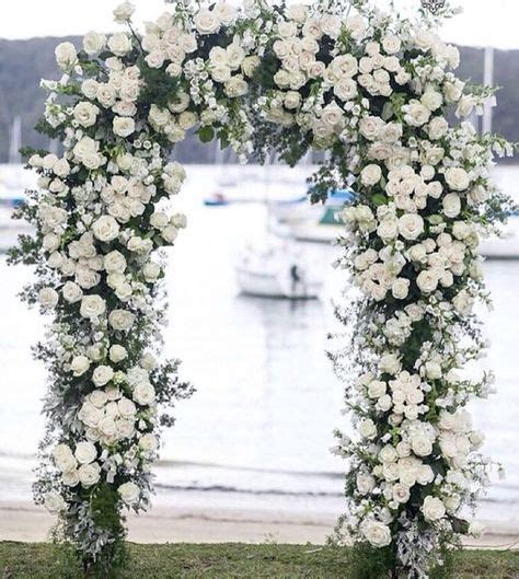 Love The All White Wedding Arches Outdoors Wedding Arch Flowers