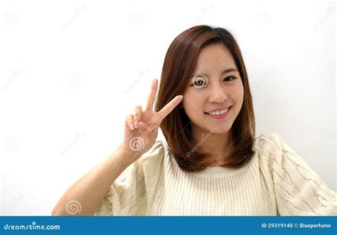 Smiling Young Woman Two Finger Peace Sign Hand Gesture Stock Photo