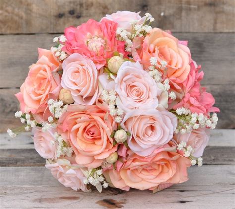 Maybe you would like to learn more about one of these? Silk Bridal Bouquet with Peach Roses, Coral Dahlias ...