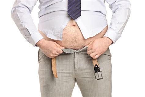 Overweight Man Trying To Fasten Too Small Clothes Stock Image Image