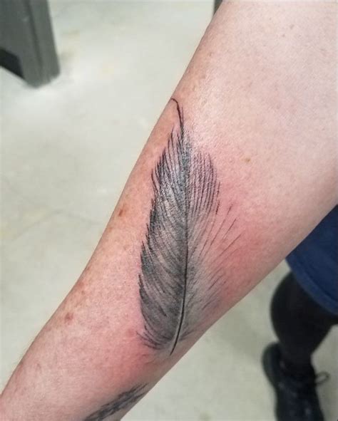 Feather Tattoo 56 Best Feather Tattoo Designs And Ideas