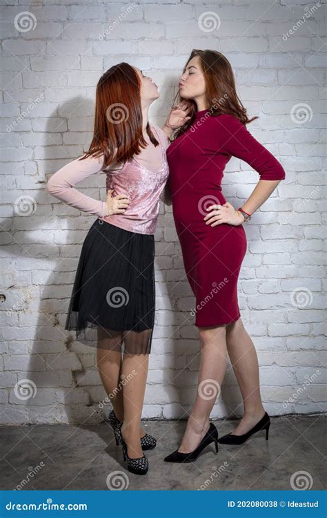 Beautiful Teen Girls Giving A Kiss To Each Other Stock Photo Image Of