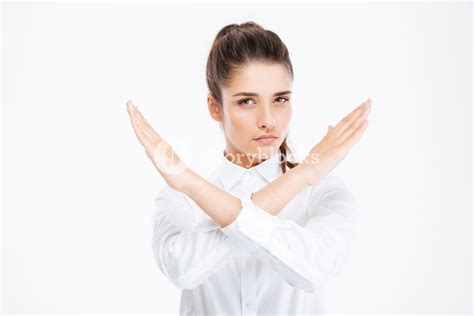 Beautiful Young Businesswoman With Crossed Hands Showing Stop Gesture