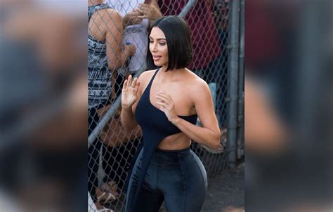 Kim Kardashians Ribs Pop Out Of Outfit After Skinny Comments