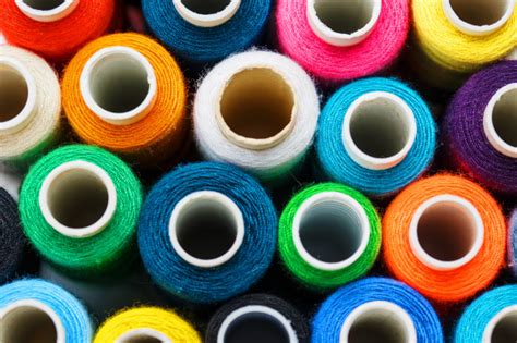 Premium Photo Colorful Spools Of Sewing Thread Colored Thread For Sewing