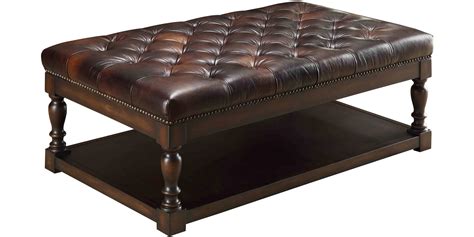 Not only do they make comfortable footstools, ottomans also double as coffee tables and storage for relaxation essentials. Alfred Coffee Table Leather Ottoman - Ottomans And Benches