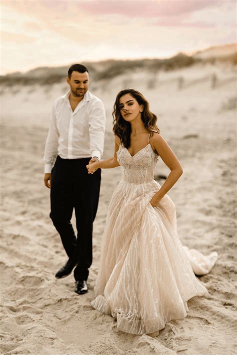 The photographers' profile pages feature extensive portfolios, with the first as a judge it's incredible to see different styles of images from around the world and as an entrant to the uk competition it's really interesting to see. Beach Wedding Photoshoot - Seaside - Anjeza Dyrmishi