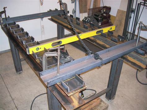 The cheapest was around 200 dollars but it was a 3ft x 9ft with a 9/16 thick steel top, frame was made of 4in x 4in box tubing with 4 1/2 in round tube legs. Building a new fab/weld table, part 2...