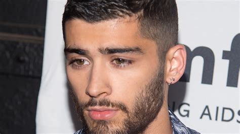 The top is cut in short layers with heavily textured tips creating a spiky, edgy look in the tousled hair on top. Zayn Malik is Letting His Beard Get Weird | GQ