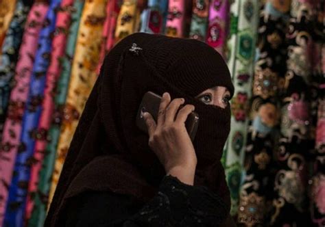 xinjiang province in china bans wearing of burqa by muslim women world news india tv