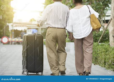 Senior travelers stock image. Image of senior, suitcase - 139440425