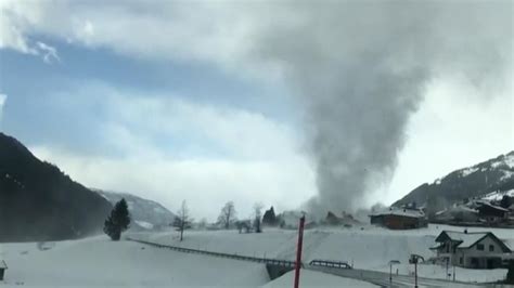 Snow Tornado Blows Through Picturesque Alpine Village