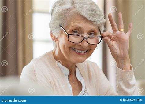 Senior Woman Holding Eyeglasses Stock Image Image Of Hand Older