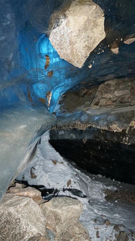 There Are Rocks And Ice Inside The Ice Cave Stock Photo Image Of