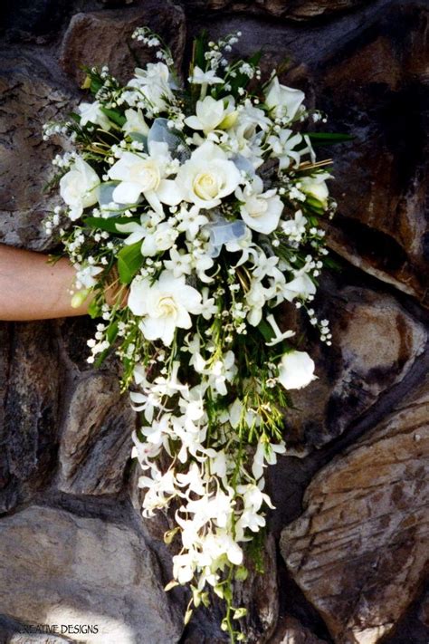 Gorgeous Cascade Wedding Bouquet Arranged With White Roses White