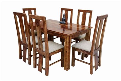 A lot of people tend to struggle in terms of style, size make sure to invest in upholstered larger choices of chairs in order to make the most out of your dining table and 6 chairs set. Buy 6 Seater Recto classic dining table with Scripto long ...